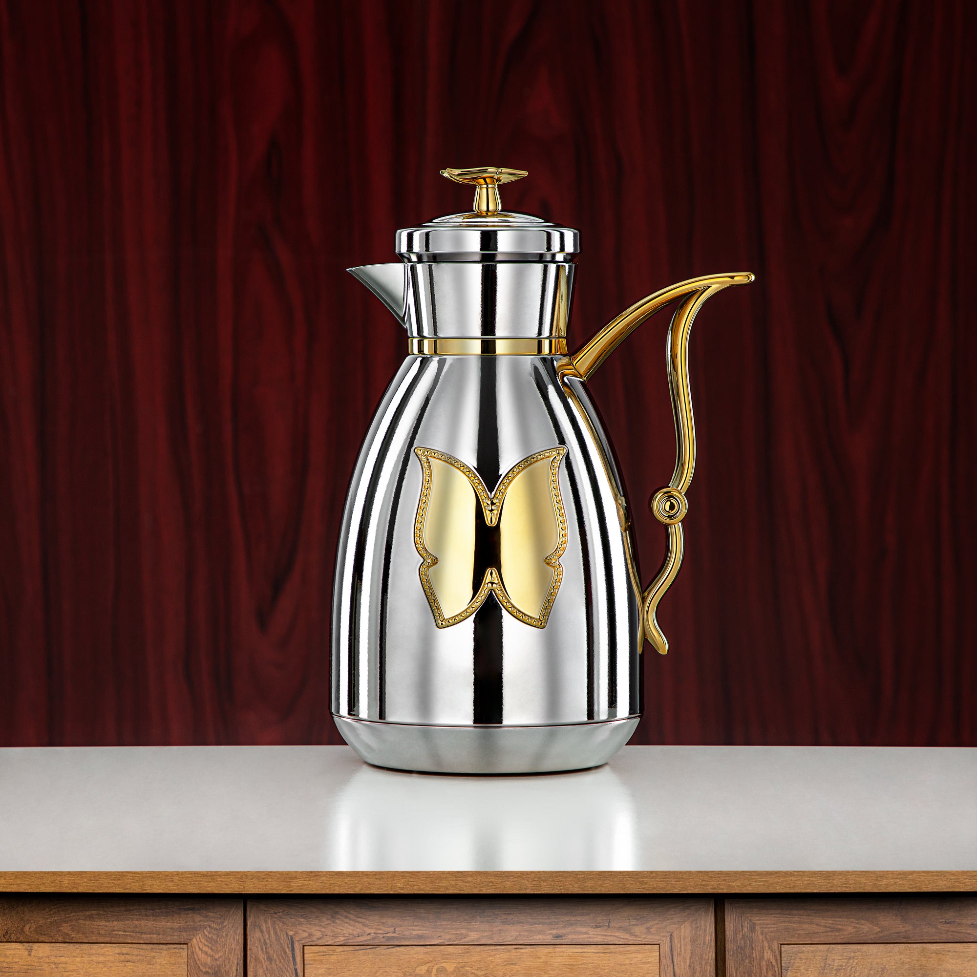 طقم ترامس المرجان زر ضغط بلاستيك 0.7 لتر + 1 لتر فضي وذهبي (SM-2C142-070/100 C/G) - زجاجة شاي وقهوة